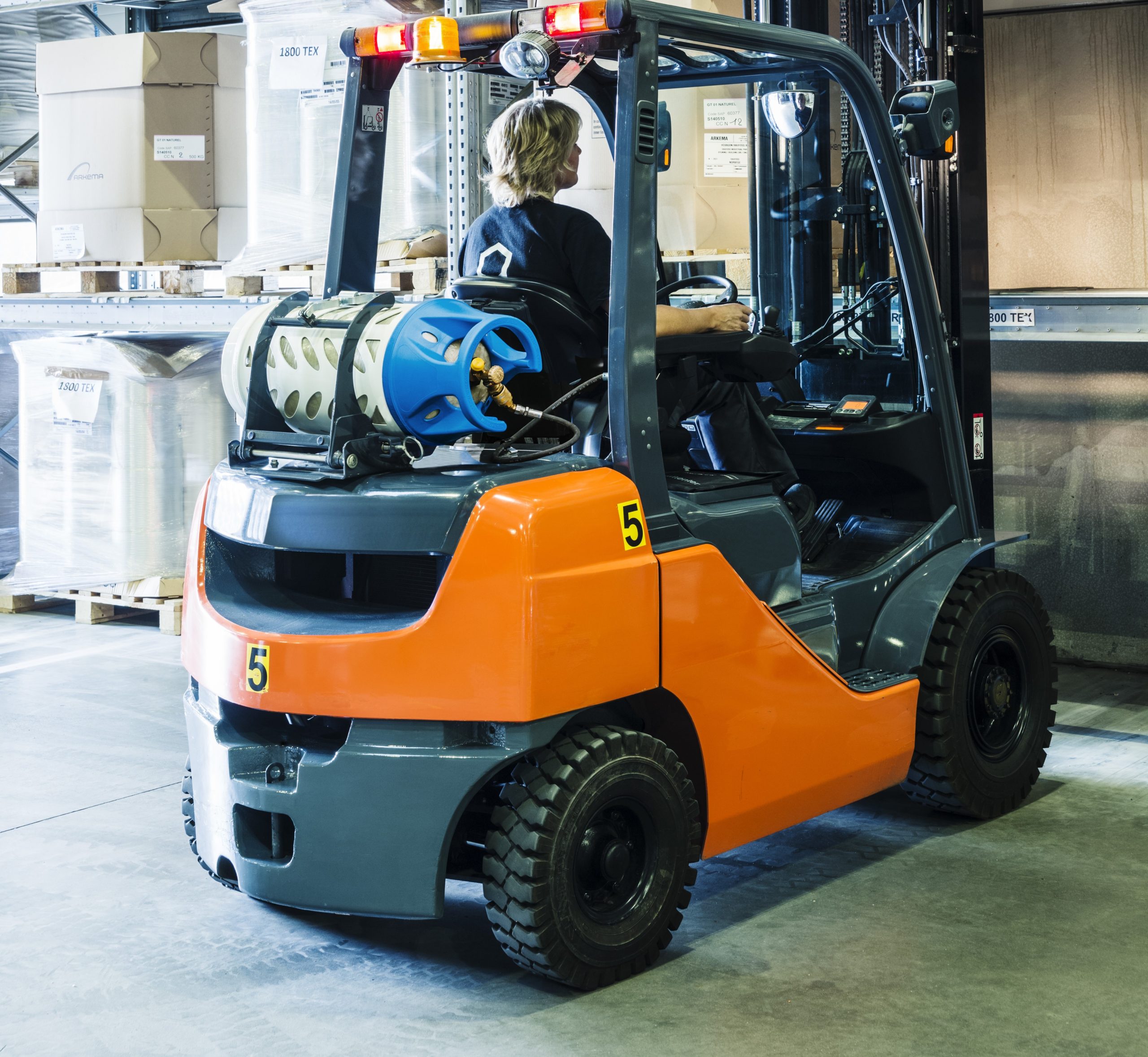 Woman Driving Forklift