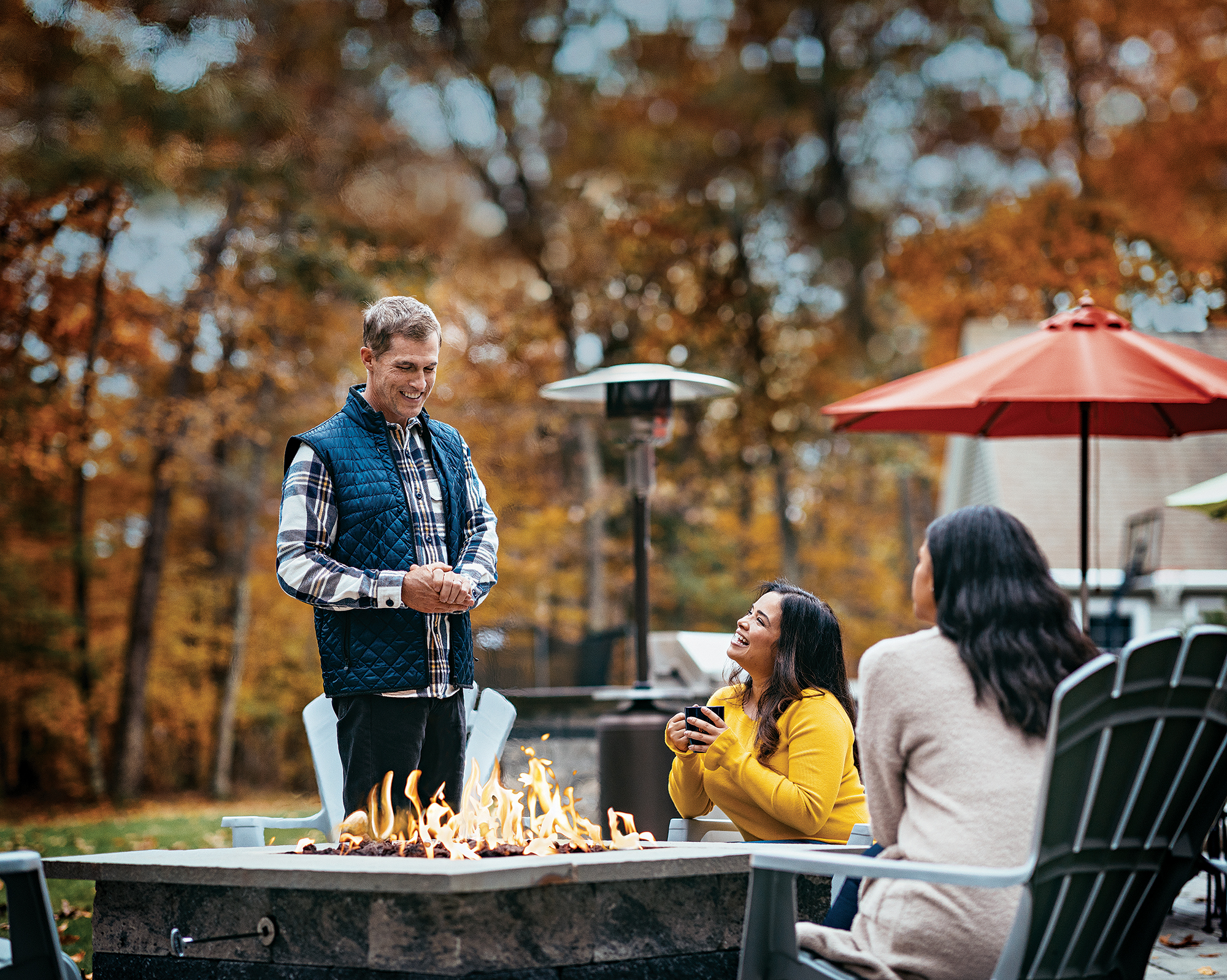 Smiling People at Propane Fueled Firepit